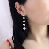 2025 new Korean earrings Internet celebrity water blue earclips women's versatile personality rhombus earrings silver needle earrings