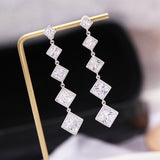 2025 new Korean earrings Internet celebrity water blue earclips women's versatile personality rhombus earrings silver needle earrings