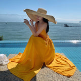 2025 Beach skirt 2025 new women's summer super fairy yellow backless dress seaside vacation dress elegant and swinging