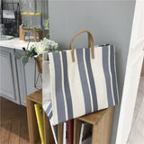 HULIANFU  autumn and winter new Korean Dongdaemun striped canvas bag, simple portable canvas bag, one-shoulder women's bag wholesale