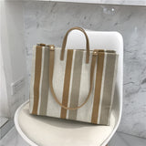 HULIANFU  autumn and winter new Korean Dongdaemun striped canvas bag, simple portable canvas bag, one-shoulder women's bag wholesale