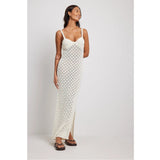 HULIANFU New summer new  vacation style knitted long skirt women's suspender skirt side split halter hollow pattern knitted skirt