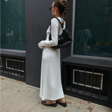 HULIANFU  2025 women's clothing New autumn knitted round neck pit strip shrinking needle horn sleeve lace-up solid color casual long dress women