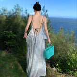 2025 Seaside vacation skirt backless photo beach skirt neck striped dress women's niche sexy beautiful suspender dress