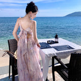 2025 Holiday wind suspender dress women's summer bow oil painting smudged seaside long dress atmosphere beach dress elegant