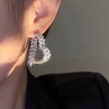 Temperament Light Luxury Sui Sui Ping An Love Earrings Women's Wheat Sui Earrings Internet celebrities Simple and advanced sense Sterling silver needle ear jewelry