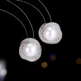 2025 Light luxury high-end  exaggerated stud earrings niche micro-inlaid zircon exquisite temperament personalized high-end pearl earrings