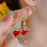 Love earrings women's niche design sense advanced popular new dragon and phoenix chengxiang nourishing ear hole temperament earrings earrings