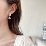 2025 New  retro fashion earrings women's light luxury niche high-end super personalized design flash zircon pearl earrings
