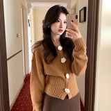 2025 popular autumn and winter new temperament flower versatile bottoming shirt long-sleeved knitted sweater women's top women's 25107
