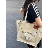 HULIANFU 2025 Large capacity bag female Korean version ins college student class schoolbag simple literary canvas shoulder bag tote bag female