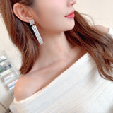 2025 Luxury high-end earrings wholesale, bright full zirconium inlaid banquet dress with long face-showing thin fringed earrings