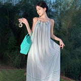 2025 Seaside vacation skirt backless photo beach skirt neck striped dress women's niche sexy beautiful suspender dress