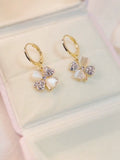 Early summer new lucky grass earrings micro-inlaid temperament four-leaf clover cute ear buckle lady temperament versatile silver needle earrings
