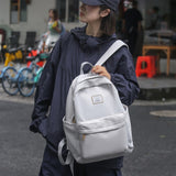 2025 Large capacity women's backpack women's high-end black and white schoolbag simple junior high school high school college student backpack
