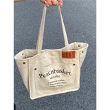 HULIANFU 2025 Large capacity bag female Korean version ins college student class schoolbag simple literary canvas shoulder bag tote bag female