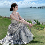 2025 Seaside vacation style new Chinese beach skirt high sense retro ink temperament beautiful v-neck suspender dress