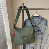 HULIANFU 2025 spring new casual light nylon cloth small bag Japanese style solid color simple letter embroidery shoulder bag crossbody