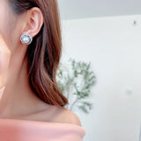 2025 S925 silver needle light luxury fashion elegant temperament earrings women's high-end design sense three-dimensional hollow flower pearl stud earrings
