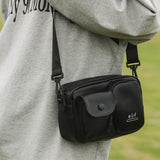 HULIANFU 2025 Casual messenger bag fashion outdoor sports Korean version small square bag simple design sense backpack Japanese ins shoulder bag