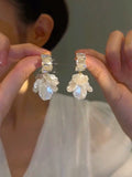 Light luxury high-end shell flower earrings niche design earrings women's flash diamond silver needle earrings new popular earrings