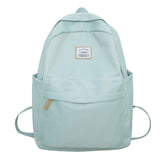 2025 Large capacity women's backpack women's high-end black and white schoolbag simple junior high school high school college student backpack