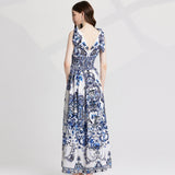 Real shot, sexy V-neck positioning printed rubber band high-waisted dress, bow strap skirt is thin and versatile.