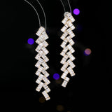 2025 Luxury exaggerated earrings design sense geometric wavy zircon inlaid long banquet dress with earrings wholesale