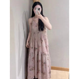 Cold wind cotton and linen suspender floral dress women's  summer new temperament thin medium and long dress women's doll skirt