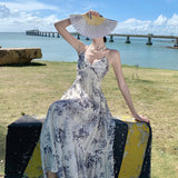 2025 Seaside vacation style new Chinese beach skirt high sense retro ink temperament beautiful v-neck suspender dress