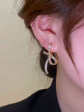 High-end light luxury zircon bow earrings, women's personality design earrings, sweet versatile ear jewelry