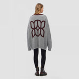 2025 Cross-border wholesale geometric shape contrasting color sweater cardigan autumn and winter popular new pocket loose women's sweater lazy