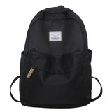 2025 Large capacity women's backpack women's high-end black and white schoolbag simple junior high school high school college student backpack