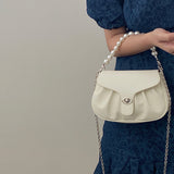 HULIANFU 2025 Celebrity style bag female new white pearl handbag fairy temperament chain crossbody pleated cloud bag