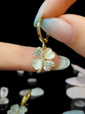 Early summer new lucky grass earrings micro-inlaid temperament four-leaf clover cute ear buckle lady temperament versatile silver needle earrings