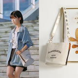 HULIANFU 2025 Canvas bucket bag women's Korean version super fire affordable girls bag wide shoulder strap large capacity single shoulder messenger tote bag