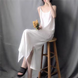 Summer new thin copper ammonia silk cool long black suspender skirt loose vest skirt long skirt women