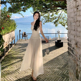 2025 Atmosphere knitted tube top dress women's high-end seaside vacation dress design temperament neck dress skirt