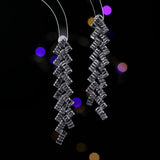 2025 Luxury exaggerated earrings design sense geometric wavy zircon inlaid long banquet dress with earrings wholesale