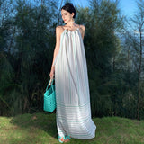 2025 Seaside vacation skirt backless photo beach skirt neck striped dress women's niche sexy beautiful suspender dress