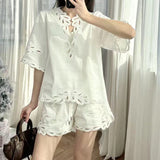 2025 Korean atmosphere wearing white hollow shirt shorts two-piece set  super fire age reduction spring women's clothing