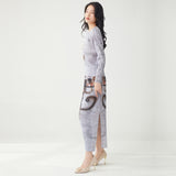 2025 suit women's high-end 2025 new printed loose long-sleeved T-shirt split skirt two-piece set