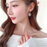 2025 literary retro elegant temperament earrings female court style high sense dripping oil leaf baroque pearl earrings