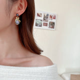 2025 literary retro elegant temperament earrings female court style high sense dripping oil leaf baroque pearl earrings