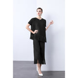 Miyake 2025 style pleated fringed design sense loose irregular top thin wide-leg pants two-piece suit women