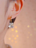 Early summer new lucky grass earrings micro-inlaid temperament four-leaf clover cute ear buckle lady temperament versatile silver needle earrings