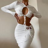 2025 New autumn and winter new sexy solid color sleeve head hollow long-sleeved top strap hip skirt two-piece set wholesale