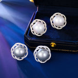2025 S925 silver needle light luxury fashion elegant temperament earrings women's high-end design sense three-dimensional hollow flower pearl stud earrings
