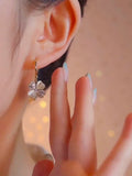 Early summer new lucky grass earrings micro-inlaid temperament four-leaf clover cute ear buckle lady temperament versatile silver needle earrings