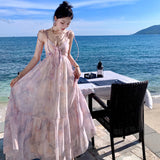 2025 Holiday wind suspender dress women's summer bow oil painting smudged seaside long dress atmosphere beach dress elegant